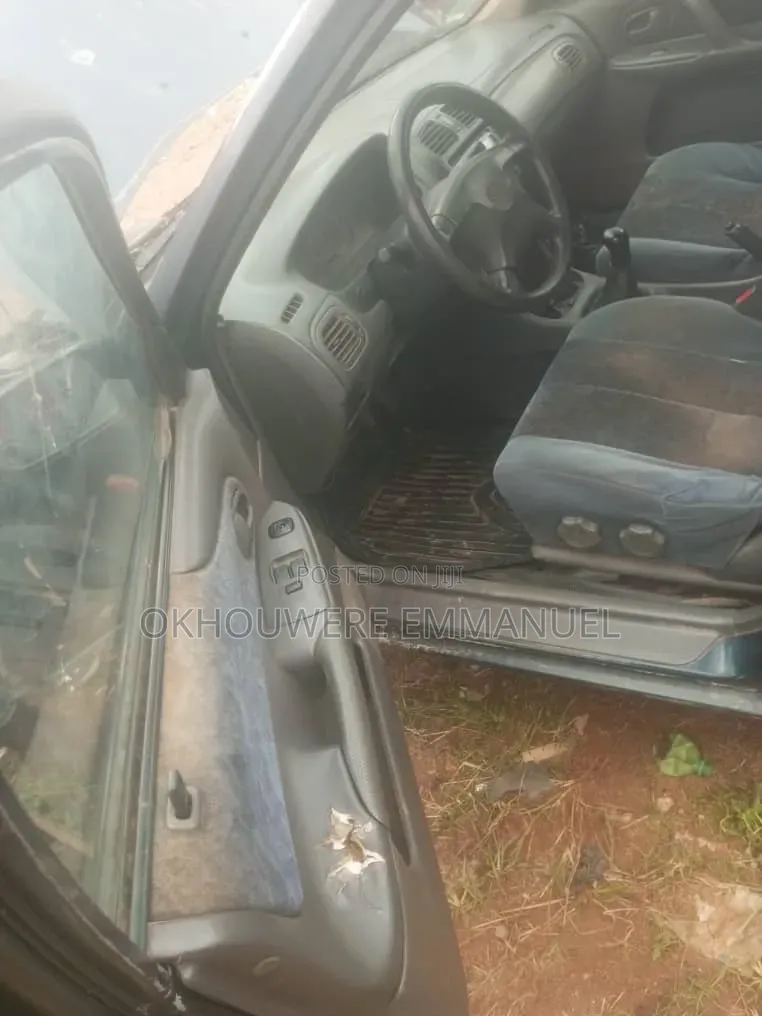 Mazda 323 1996 Blue