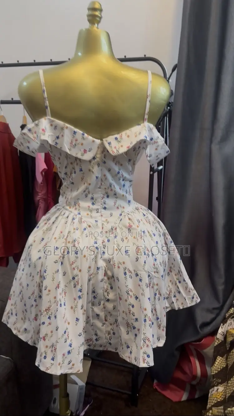 Floral Off-Shoulder Ruffle Mini Dress.