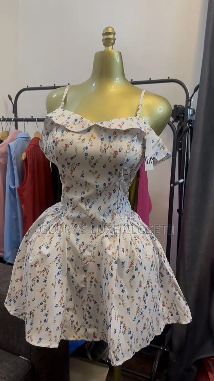 Floral Off-Shoulder Ruffle Mini Dress.