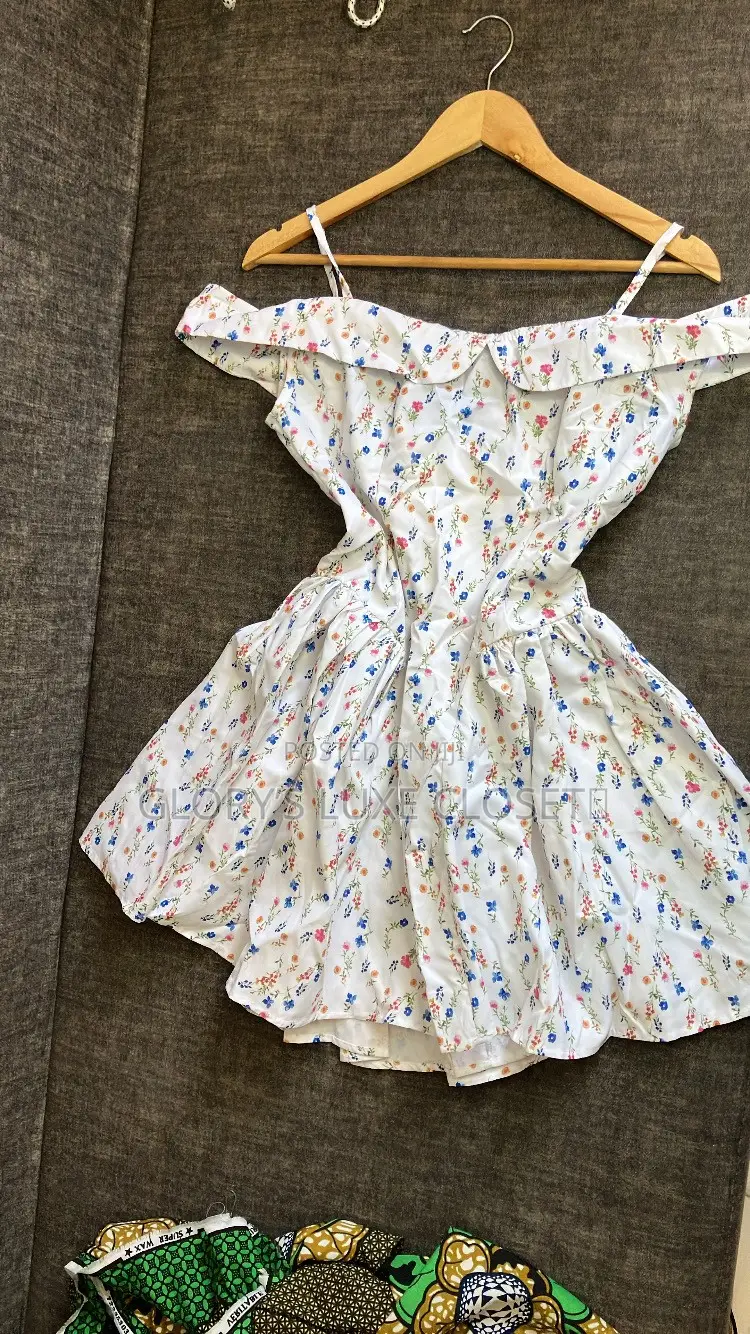 Floral Off-Shoulder Ruffle Mini Dress.