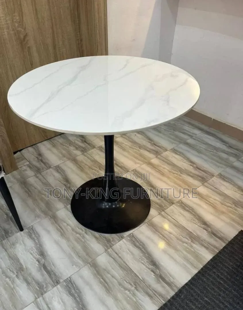 Modern Marble-Top Dining Set Features Vibrant Orange and Cream