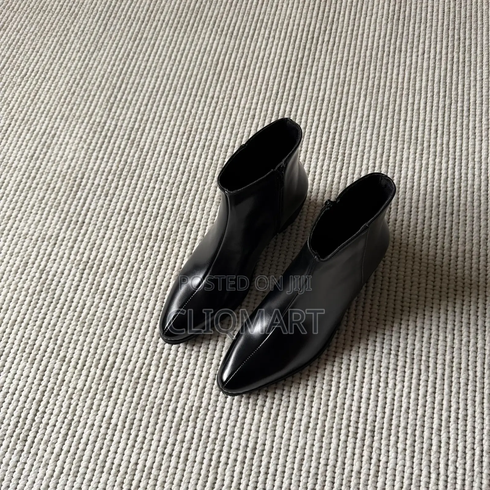 The Heeled Leather Lined Ankle Boot Available in Black and Brown Color