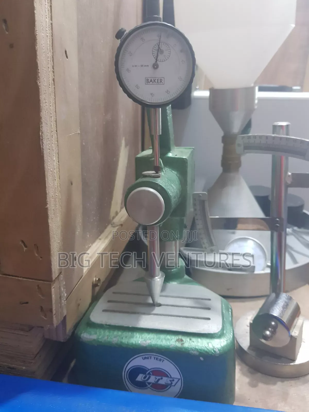 Device Shown Is a Precision Dial Comparator Stand (Or Bench Thicknes