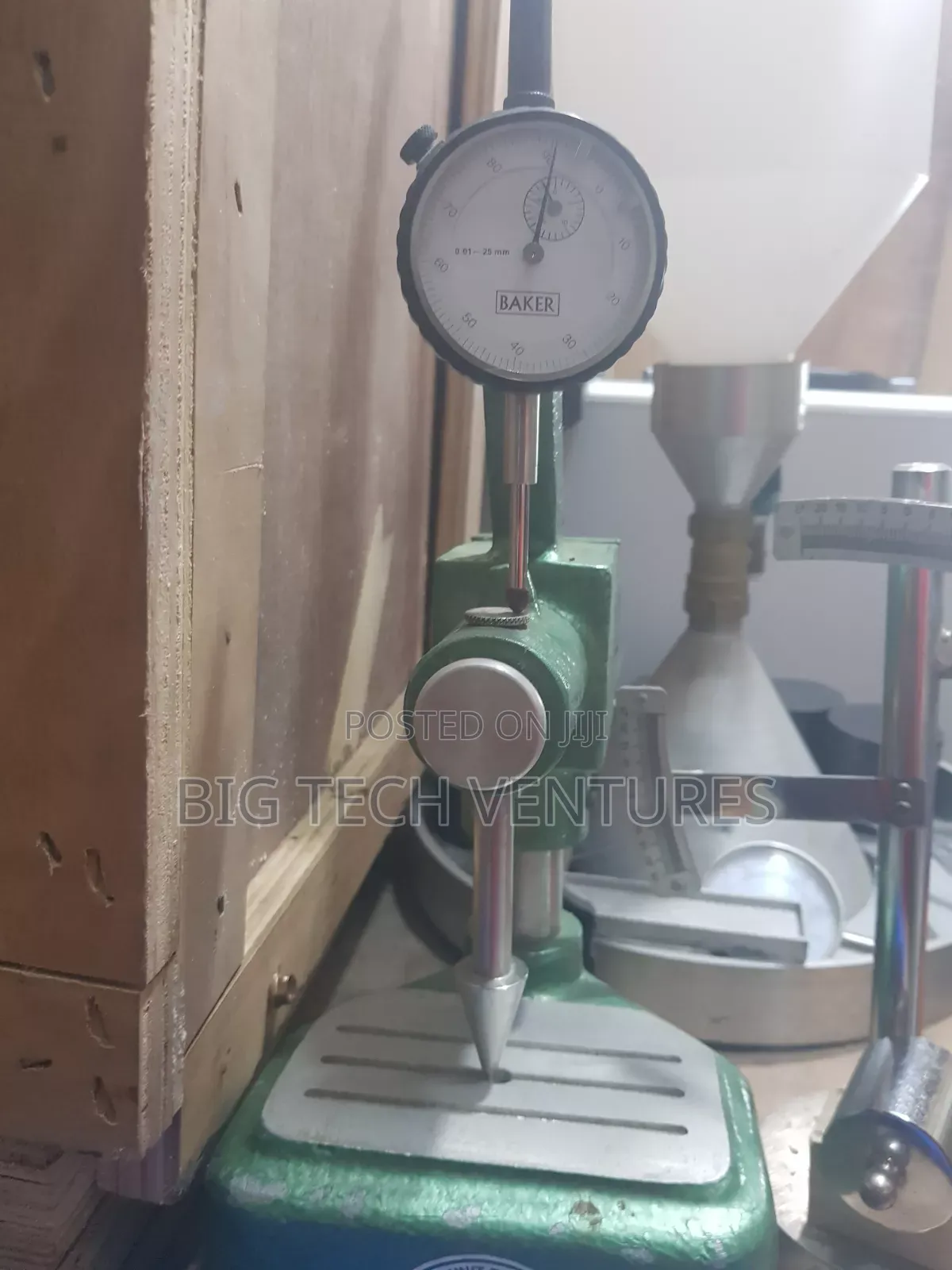 Device Shown Is a Precision Dial Comparator Stand (Or Bench Thicknes