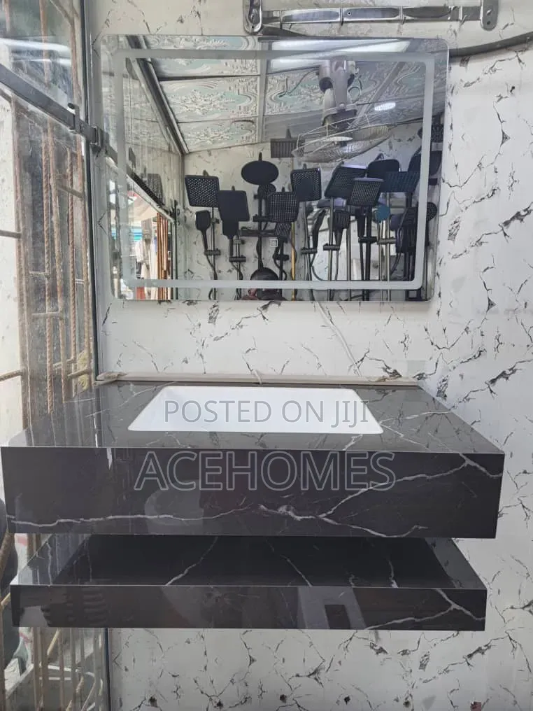 Black Marble Cabinet With White Basin