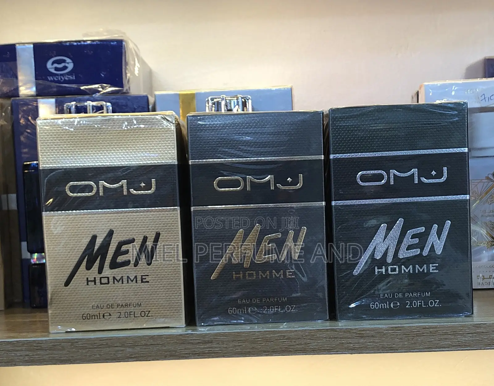 O M J Men Homme