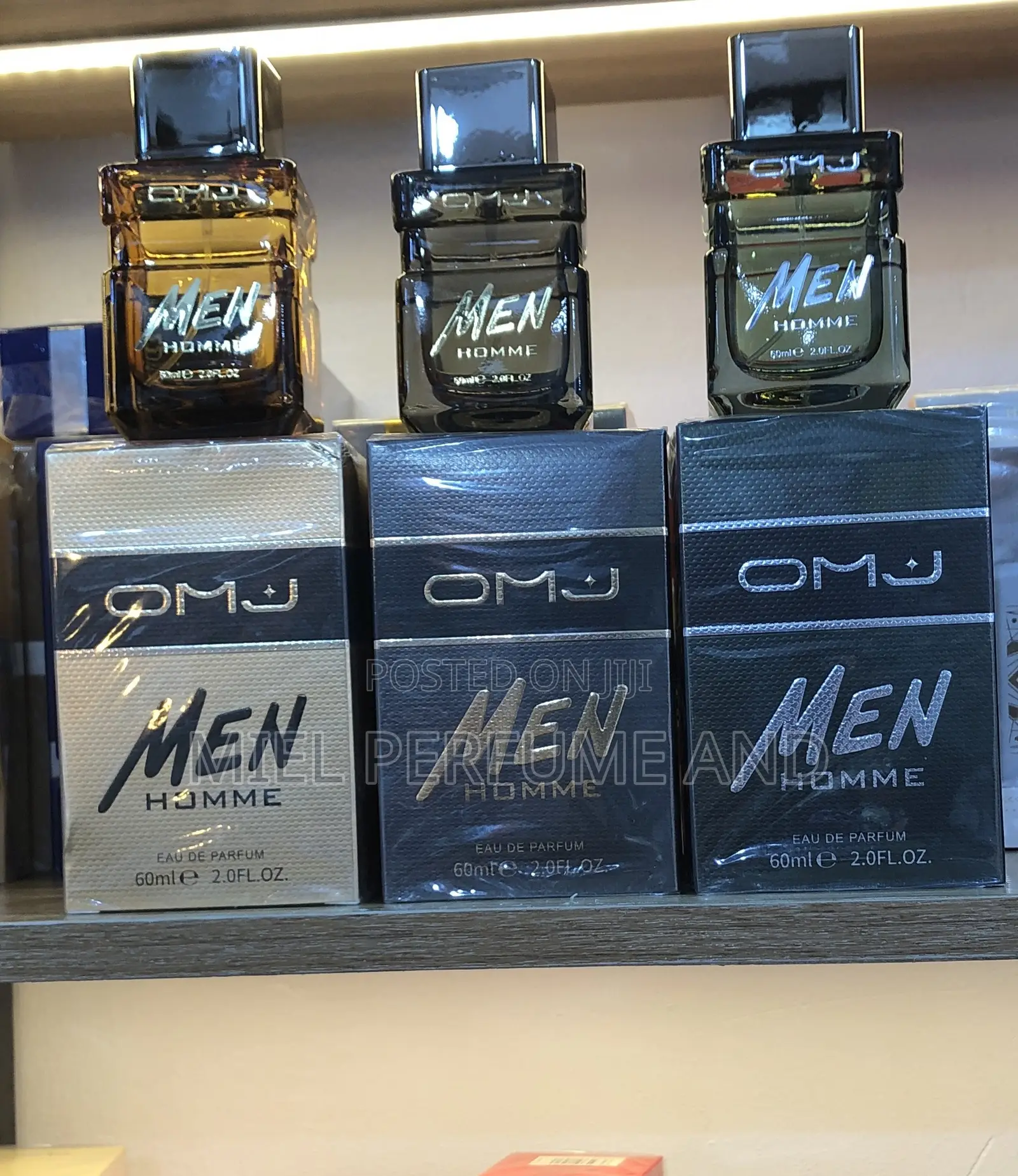 O M J Men Homme