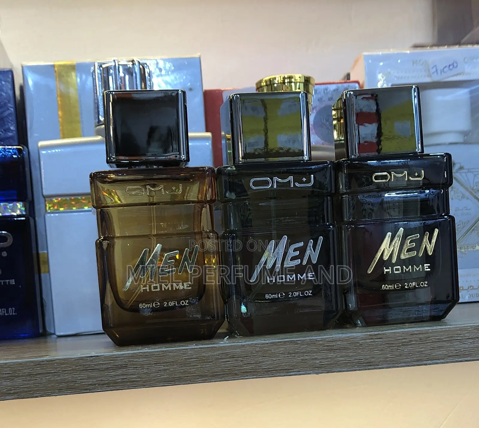 O M J Men Homme