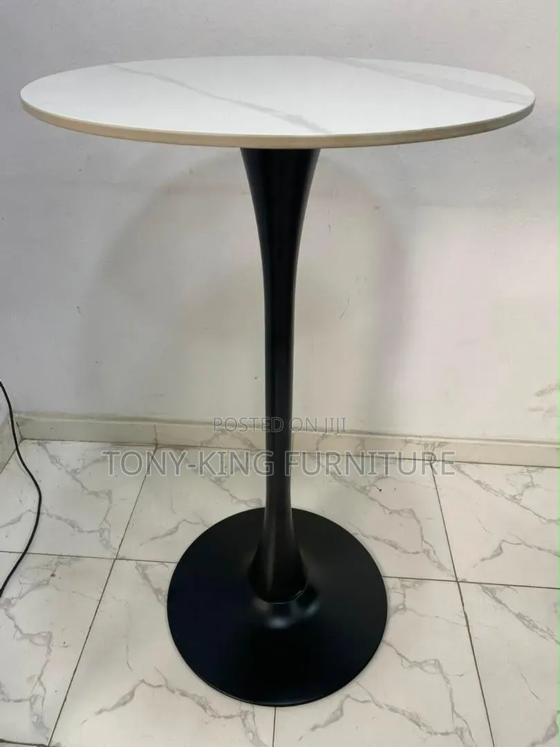 Round Bistro Bar Table Features a White Marble-Patterned Top Set