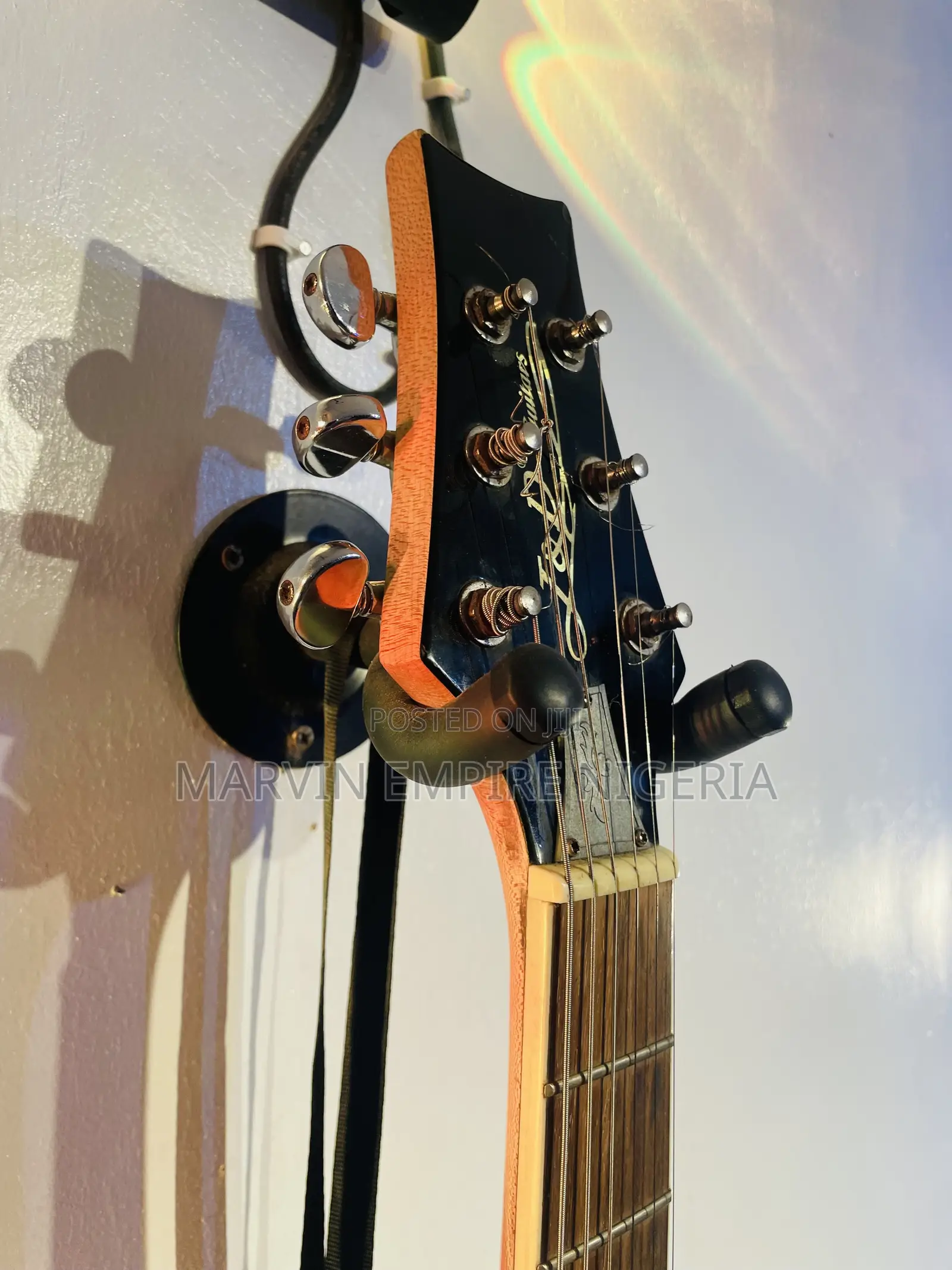 Black Double-Cutaway Jazz Electric Guitar With a Dual Humbucker Pickup