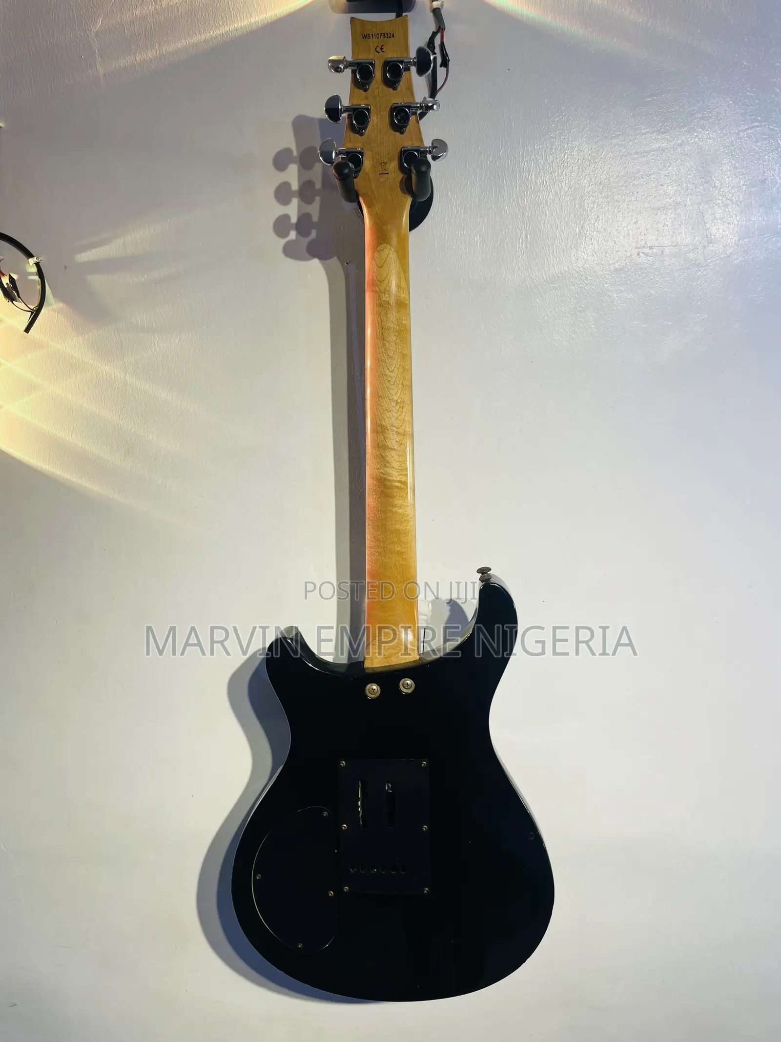 Black Double-Cutaway Jazz Electric Guitar With a Dual Humbucker Pickup