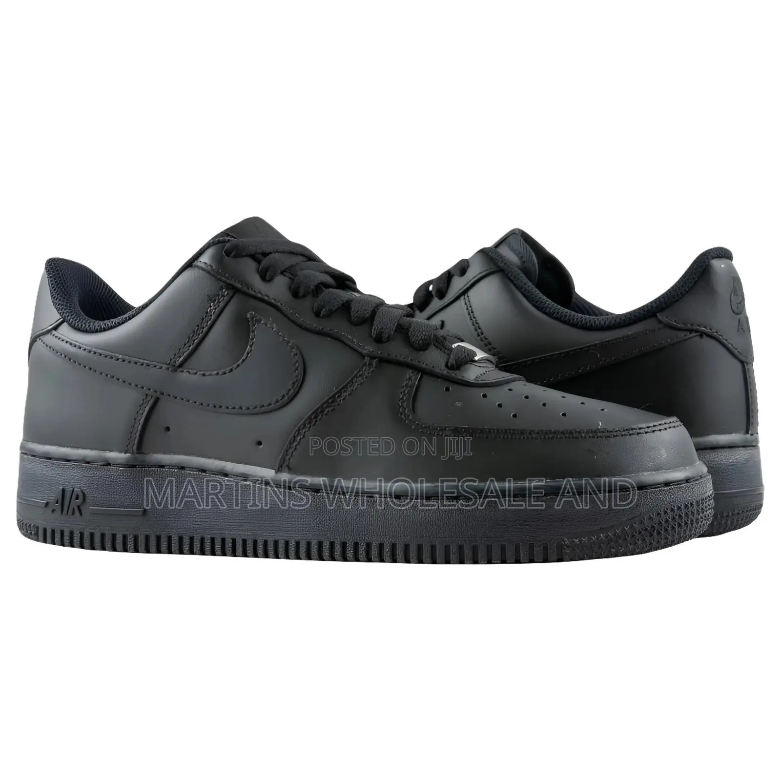 All-Black Nike Air Force 1 Low-Top Sneakers Featuring Classic Perforat
