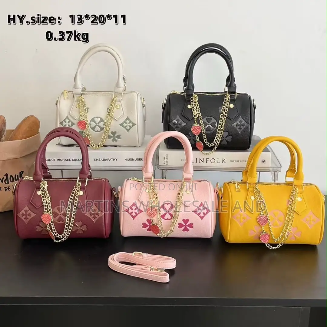 Stylish Faux-Leather Mini Barrel Handbags Feature a Distinctive