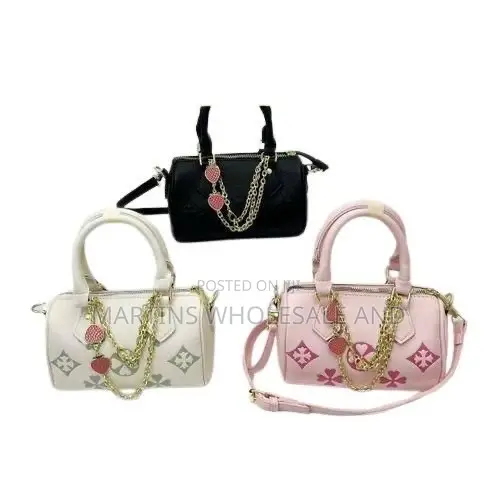 Stylish Faux-Leather Mini Barrel Handbags Feature a Distinctive