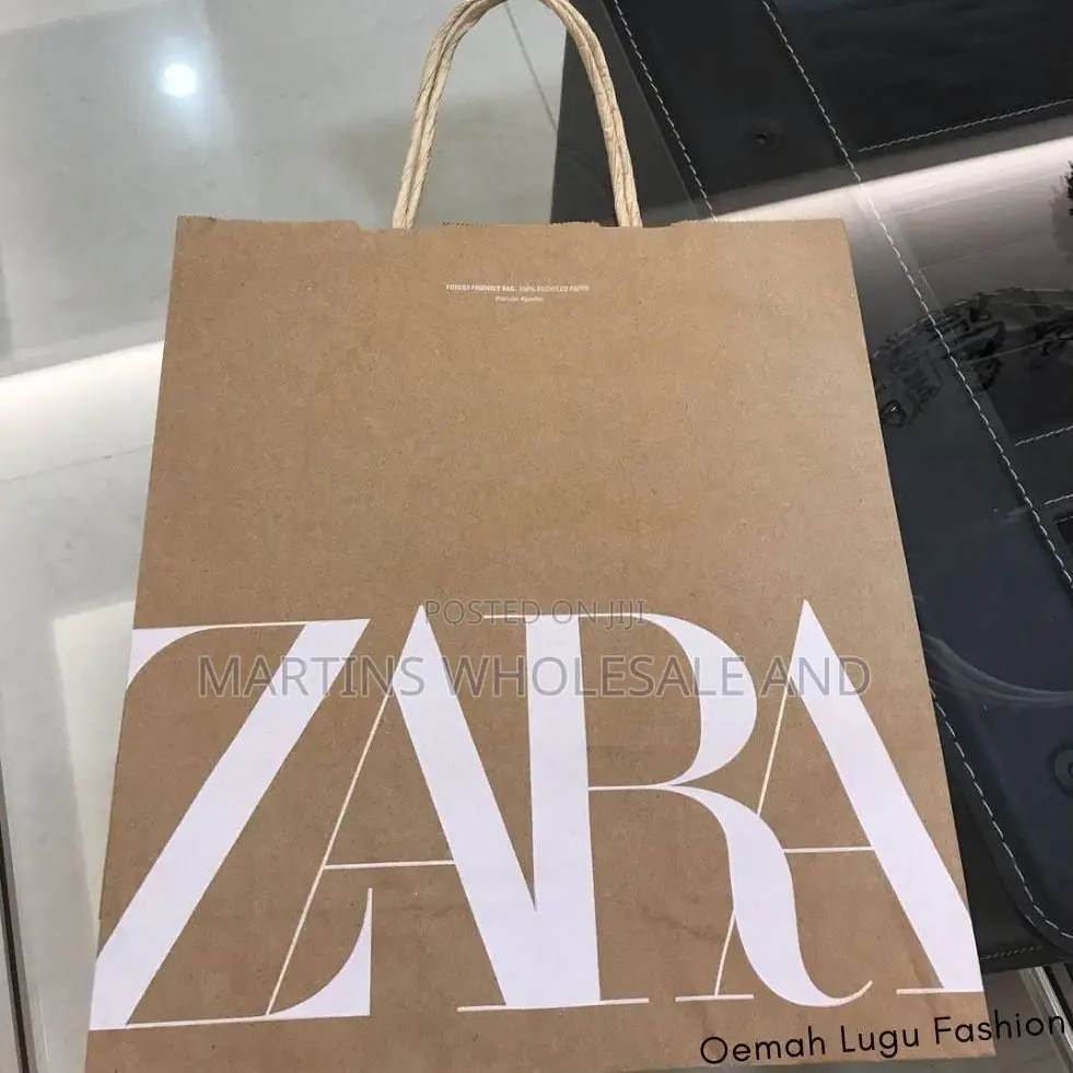 Sleek Black Zara Crossbody Bag Features a Structured Design, a Promine