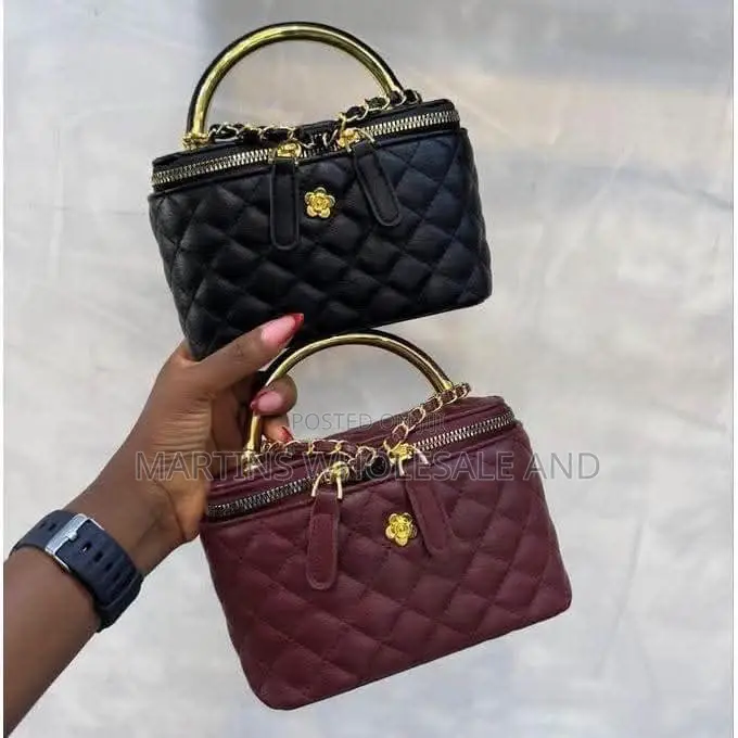 Quilted Mini Vanity Bags Feature a Structured Box Silhouette, a Gold-