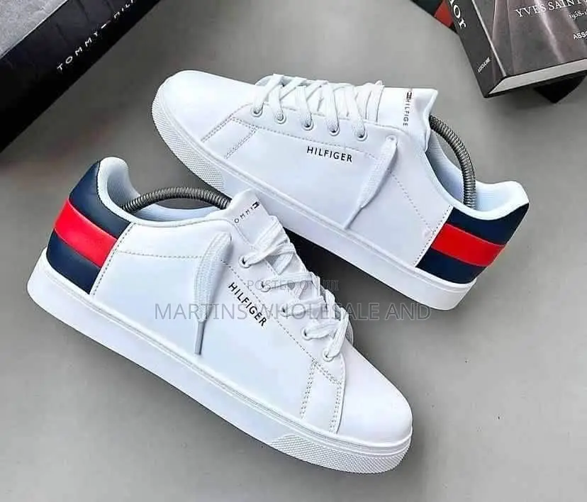 Clean White Tommy Hilfiger Essential Leather Sneakers Feature a Distin