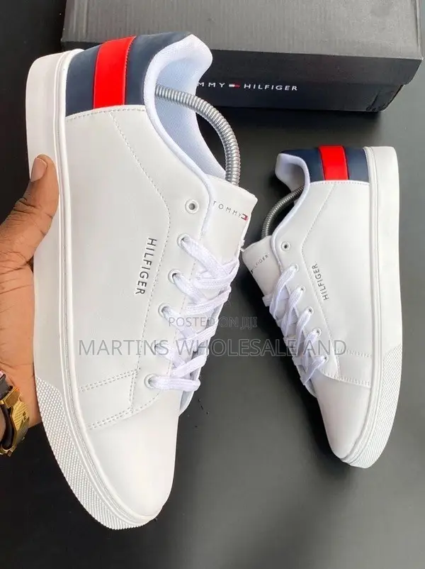 Clean White Tommy Hilfiger Essential Leather Sneakers Feature a Distin