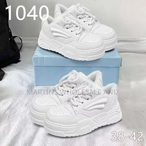 Trendy All-White Chunky Platform Sneakers Feature a Bold Ridged Sole A