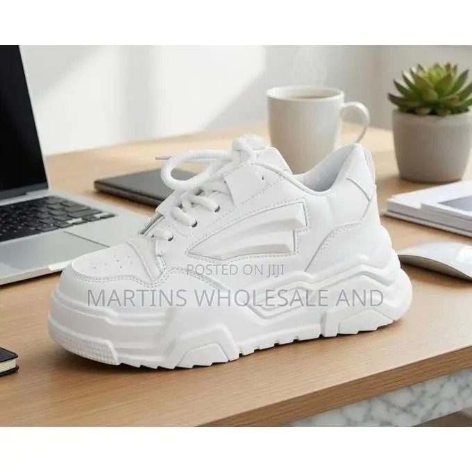 Trendy All-White Chunky Platform Sneakers Feature a Bold Ridged Sole A