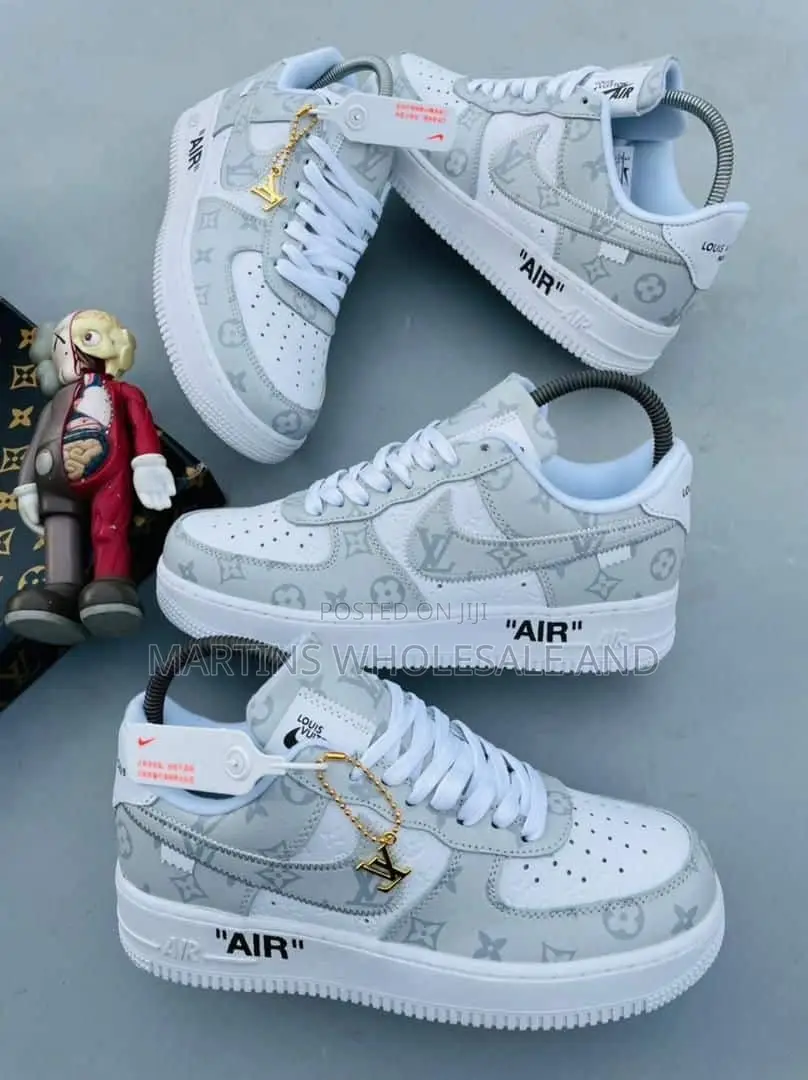 Custom Nike Air Force 1 Low-Top Sneaker Featuring a Grey and White Upp