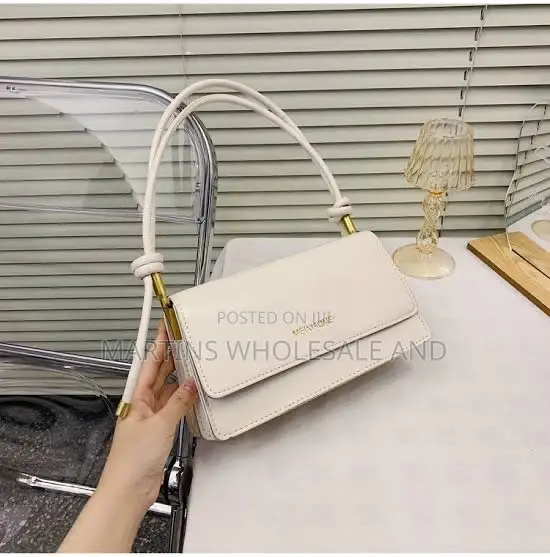 Meixiaomei Faux-Leather Shoulder Bag With a Distinct Knot Handle Detai