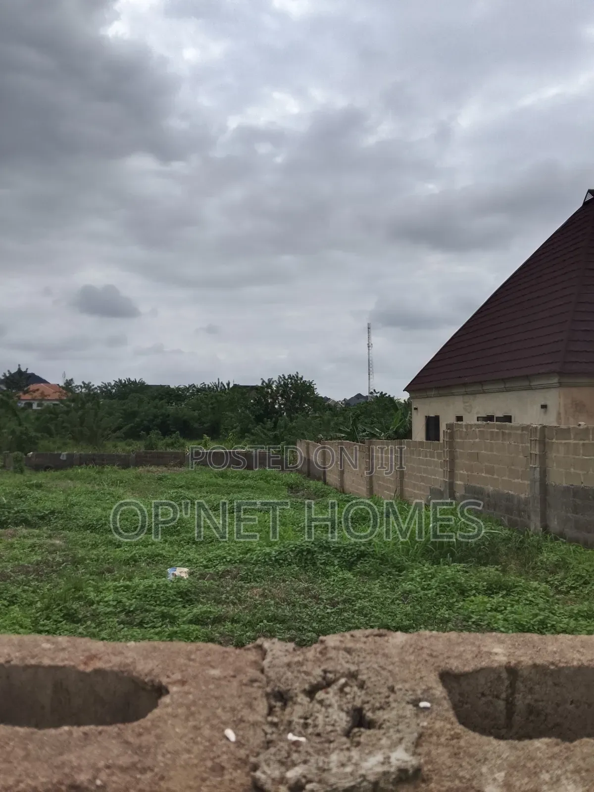 A Fenced Full Plot of Land