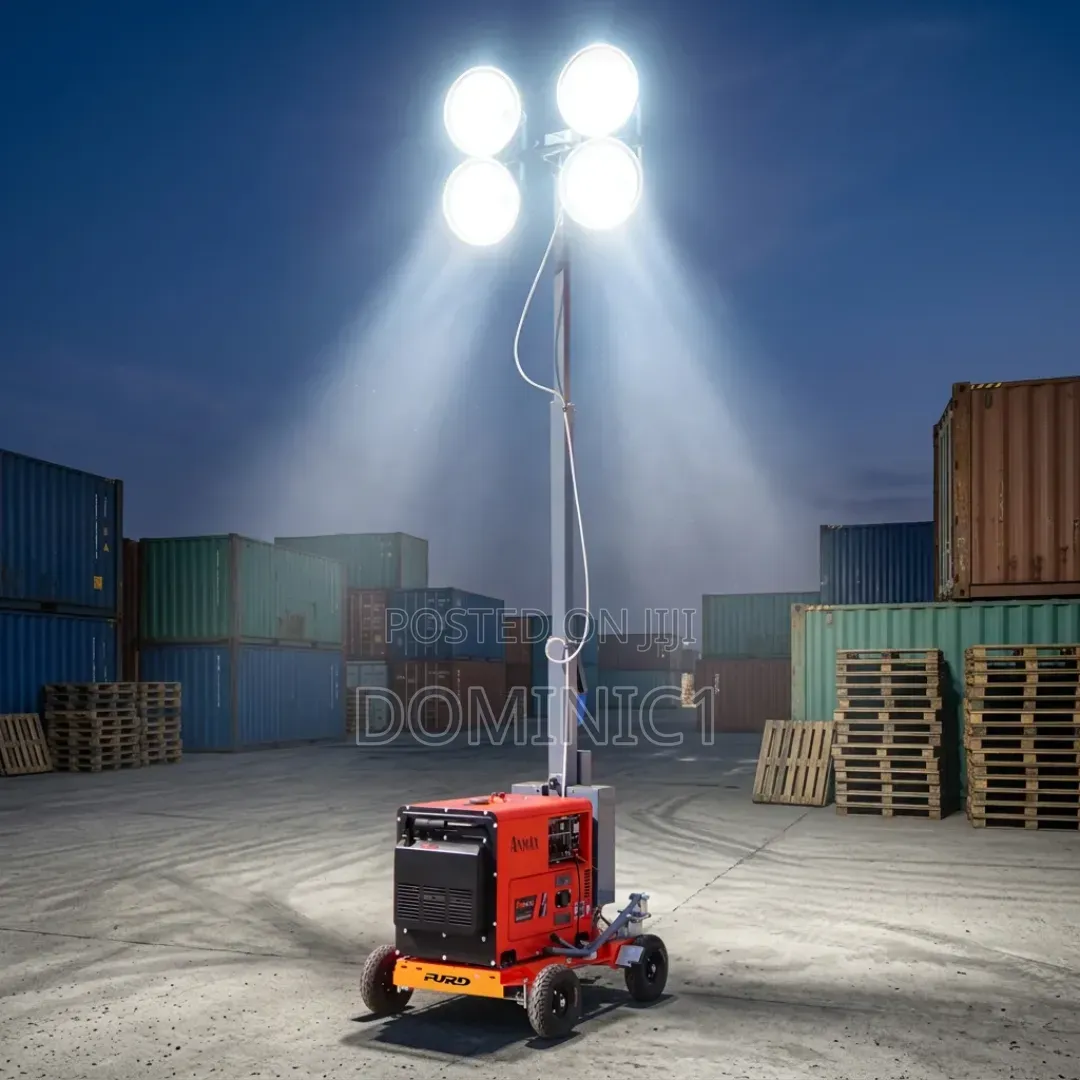 Portable Mobile Light Tower Illuminating a Construction Site at Night