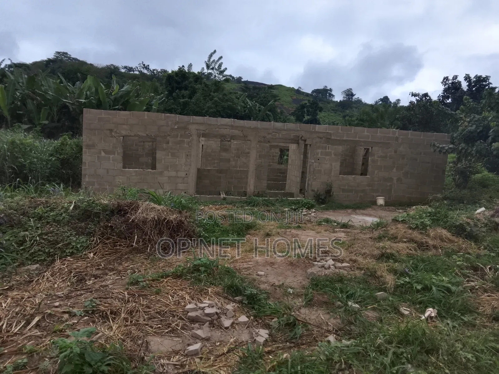 An Uncompleted Building on a Full Plot of Land
