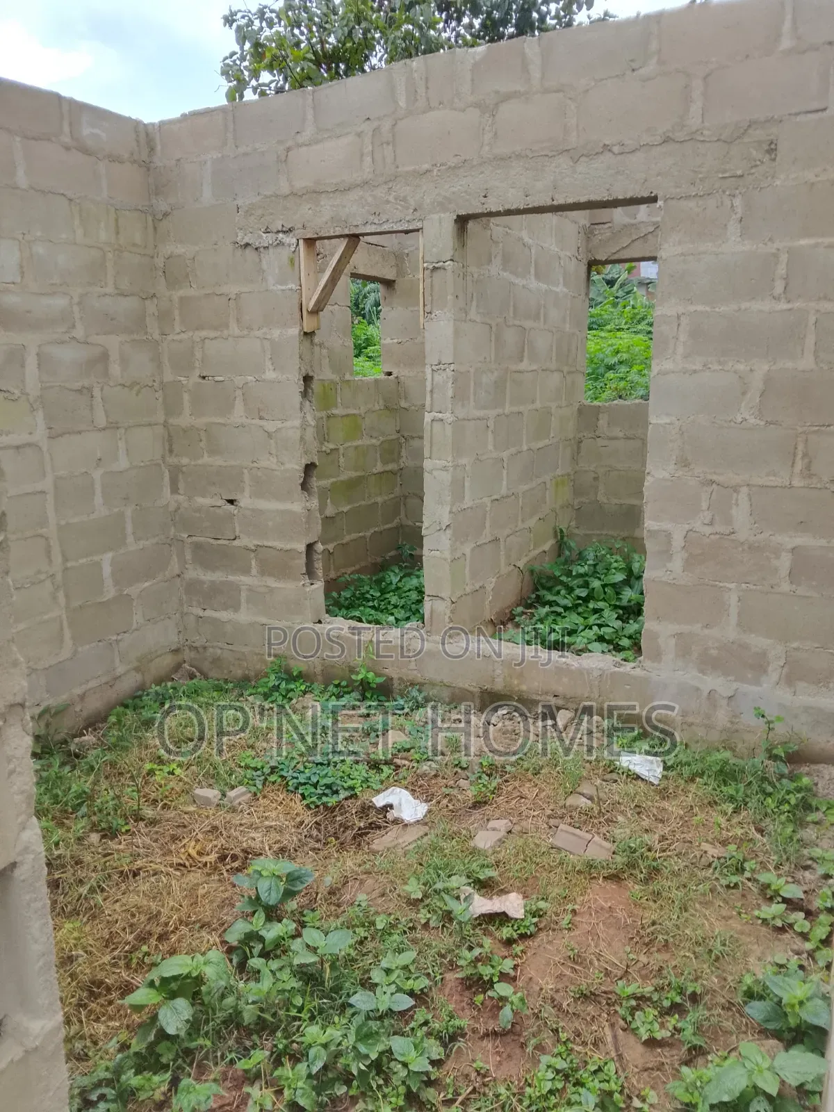 An Uncompleted Building on a Full Plot of Land