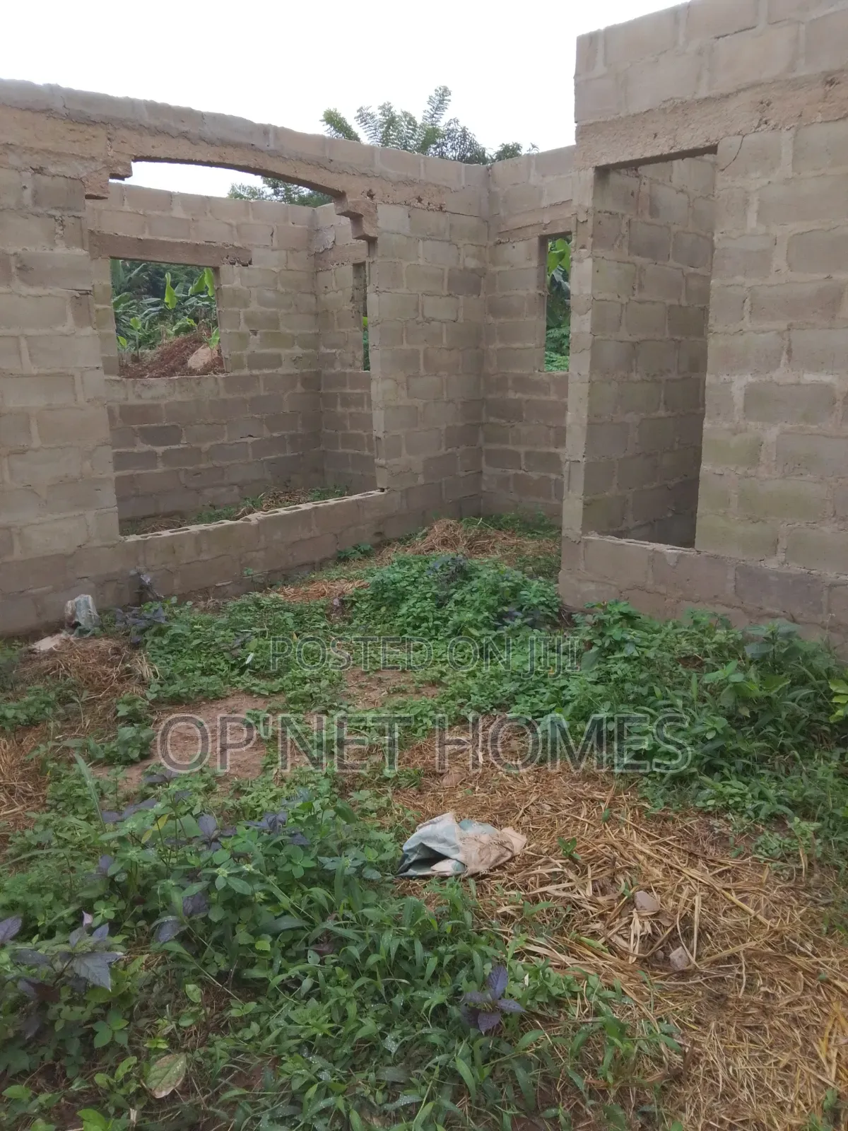 An Uncompleted Building on a Full Plot of Land