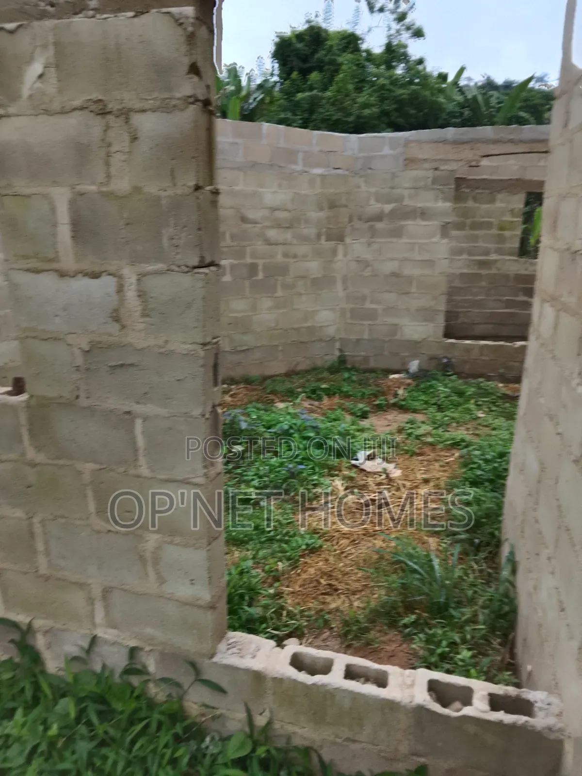 An Uncompleted Building on a Full Plot of Land