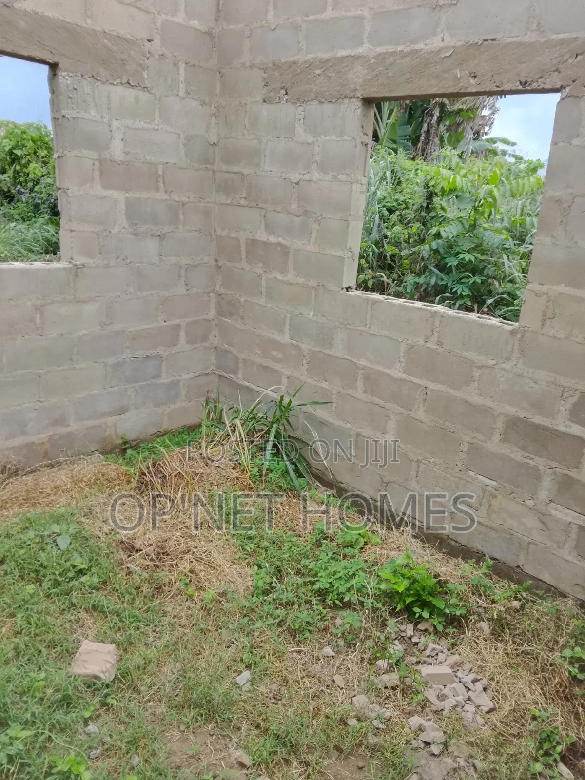 An Uncompleted Building on a Full Plot of Land