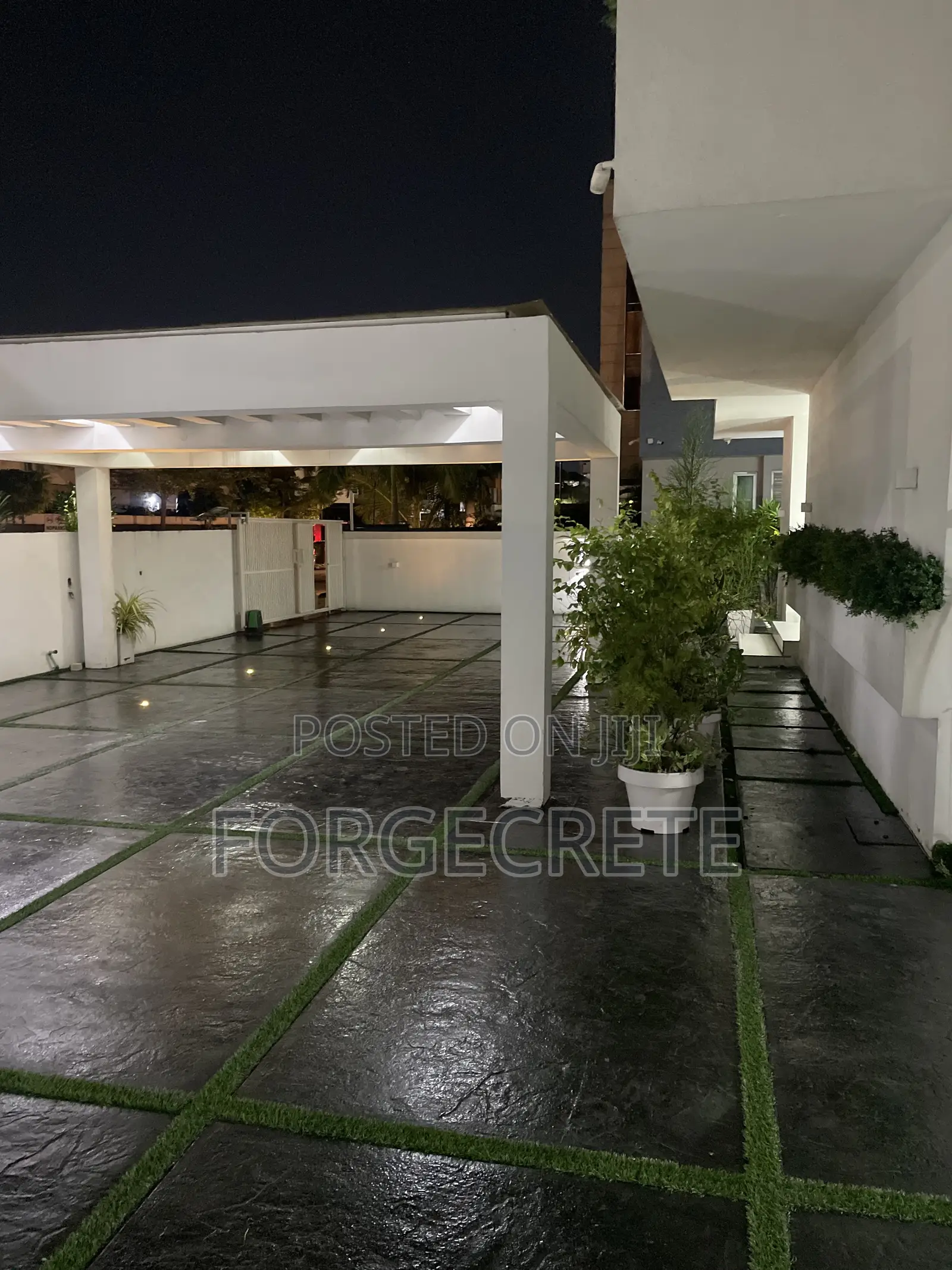 Artificial Grass and Concrete Stamp Floor Installation