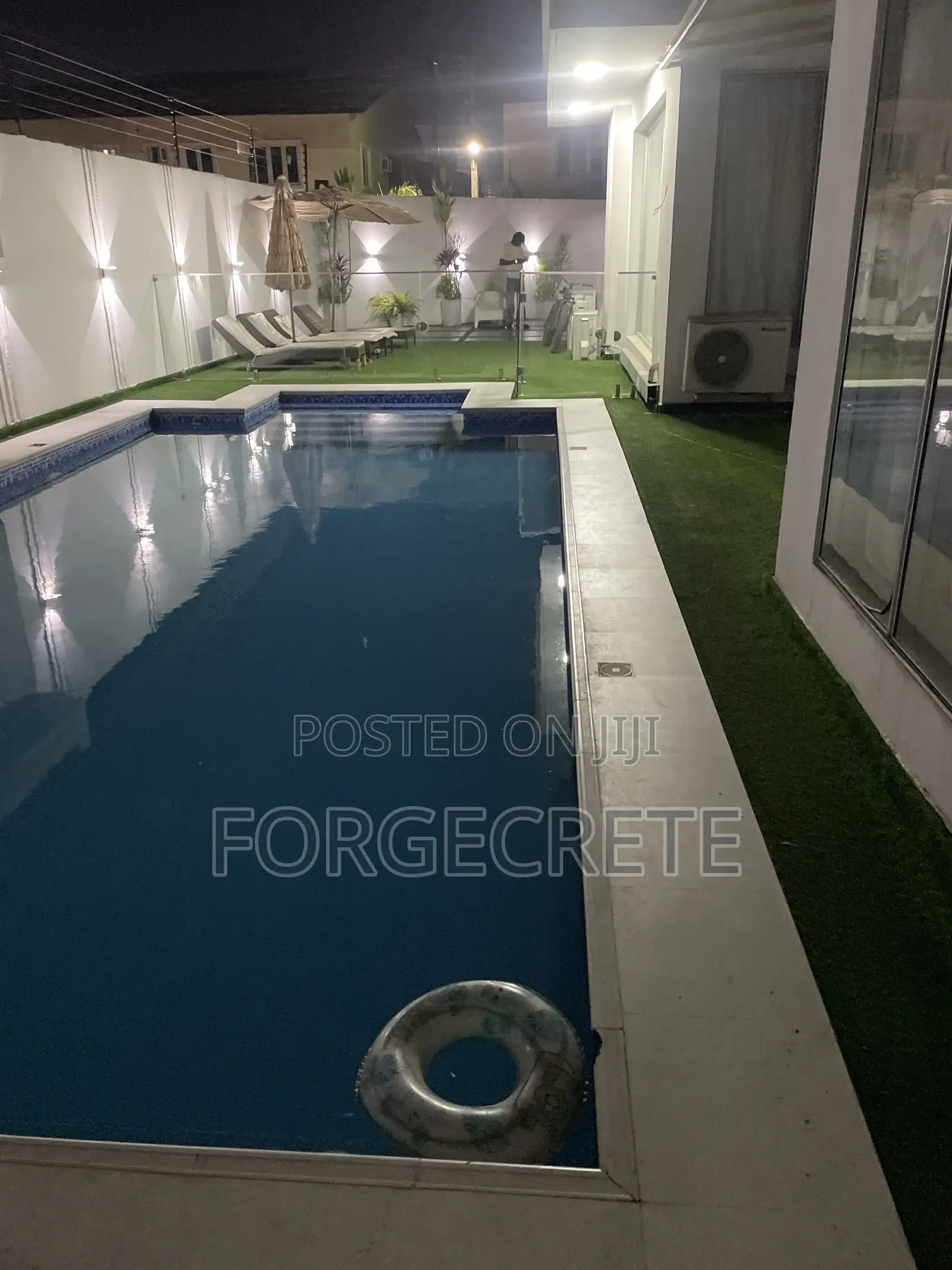 Artificial Grass and Concrete Stamp Floor Installation