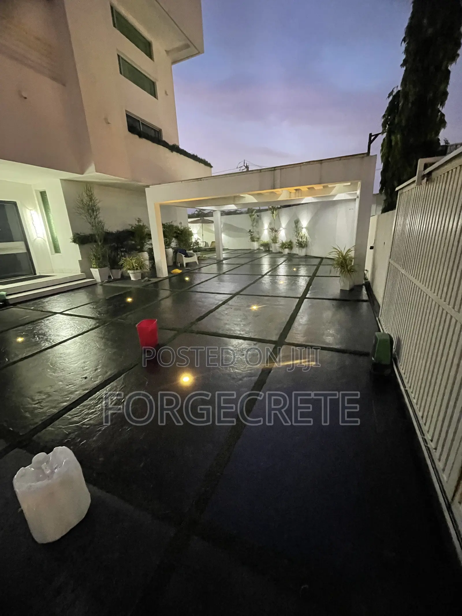 Artificial Grass and Concrete Stamp Floor Installation
