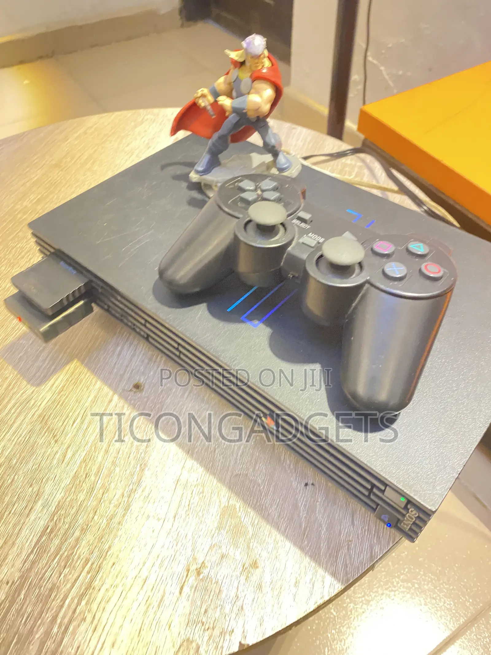 PlayStation 2 Fat With Games and One Wired Pad