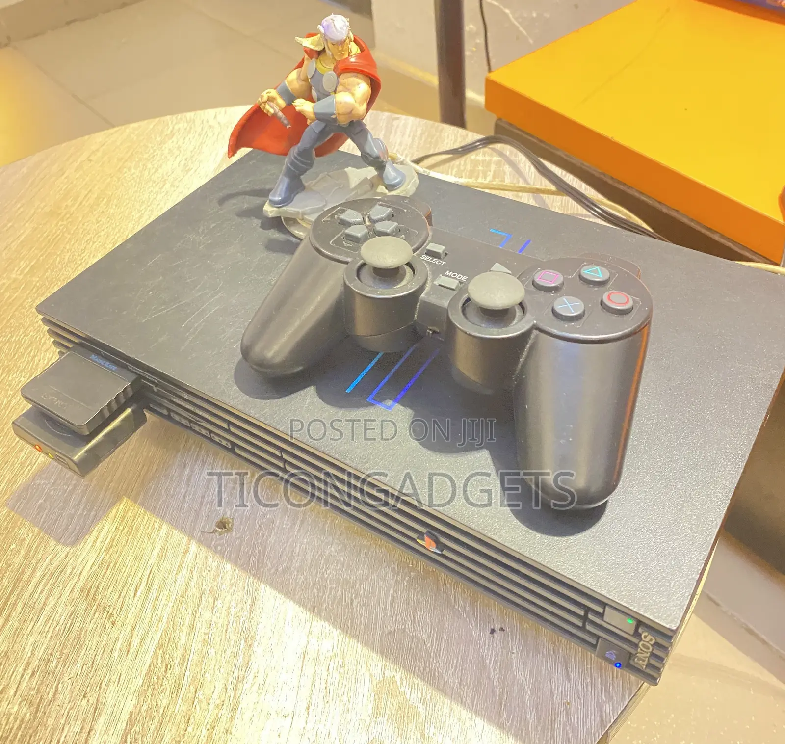 PlayStation 2 Fat With Games and One Wired Pad