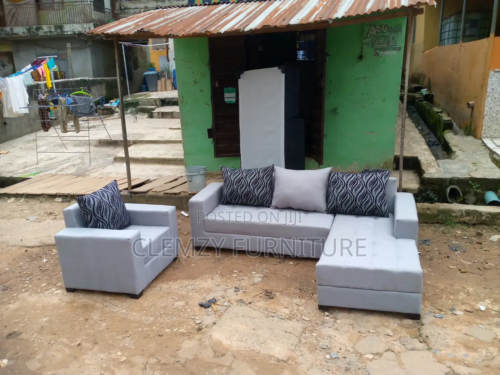 Gray Color L Shape Sofas Plus a Single Seater