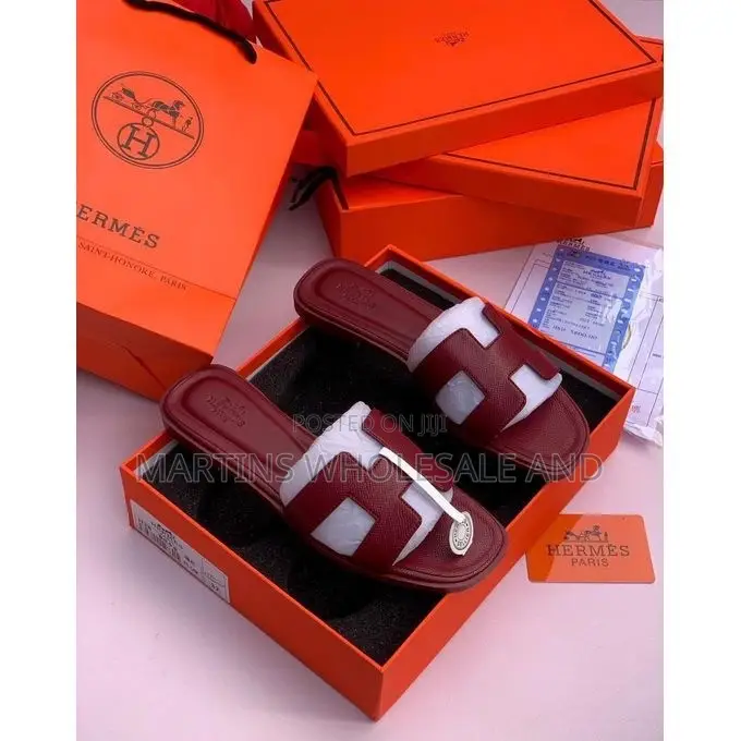 Hermes-Style Flat Slide Sandals Feature the Iconic Cutout "H" Strap De