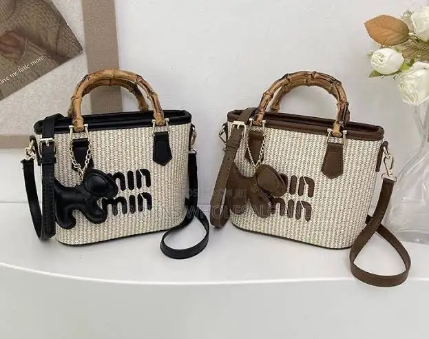 Beige and Brown Min Min Woven Straw Handbag Featuring a Bamboo-Style T