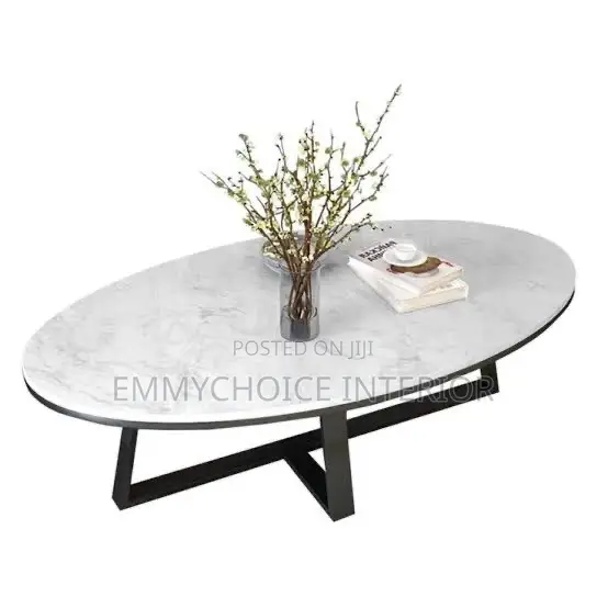 Elegant Oval Center Table With Metallic Branch Inlay