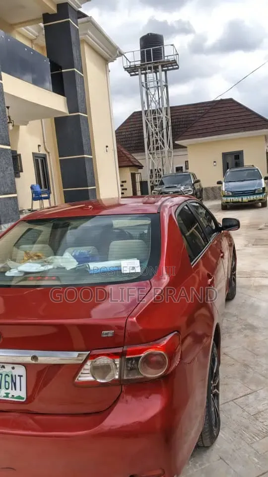 Toyota Corolla Base 4dr Sedan (1.8L 4cyl 5M) 2010 Red