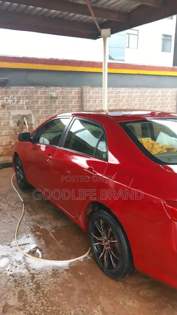 Toyota Corolla Base 4dr Sedan (1.8L 4cyl 5M) 2010 Red