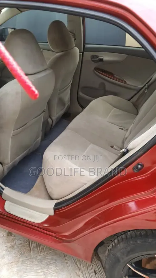 Toyota Corolla Base 4dr Sedan (1.8L 4cyl 5M) 2010 Red
