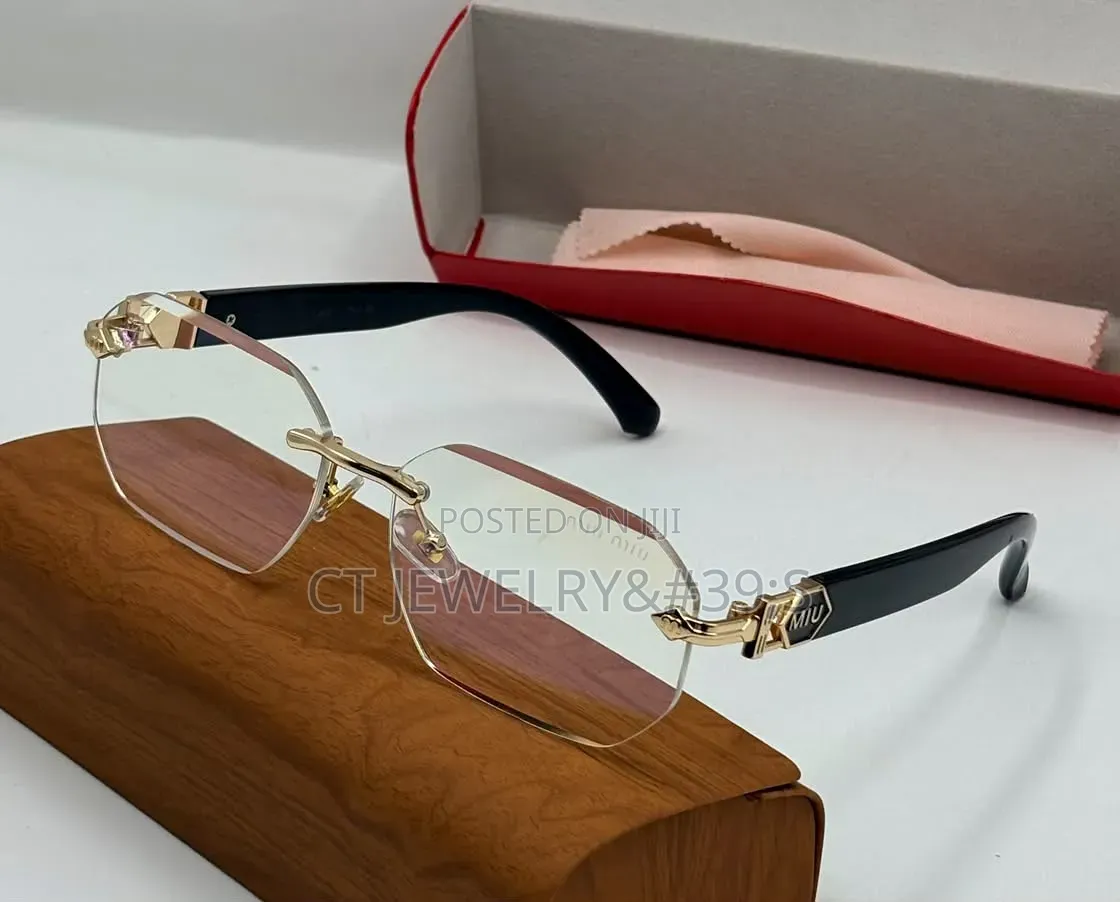 Sleek Cartier/MiuMiu Rimless Sunglasses Transparent