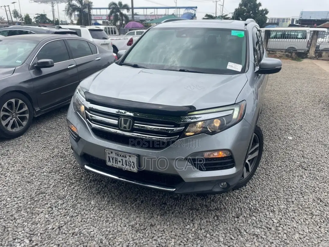 Honda Pilot Touring 4dr SUV 4WD (3.5L 6cyl 9A) 2016 Silver