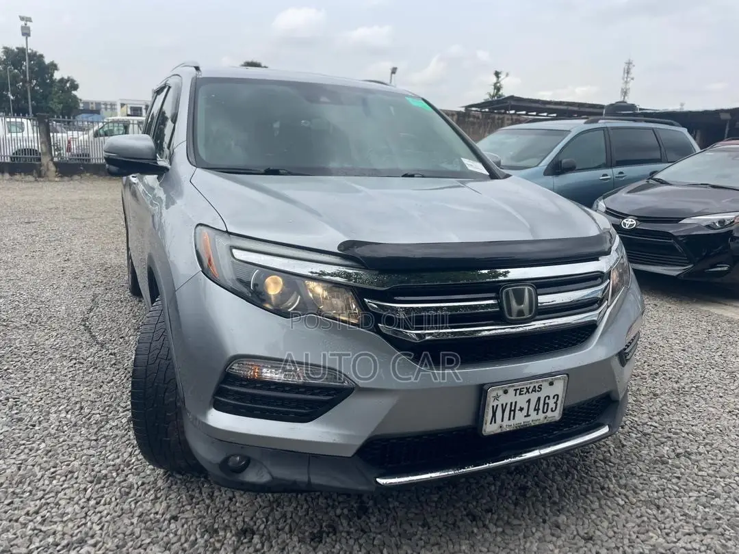 Honda Pilot Touring 4dr SUV 4WD (3.5L 6cyl 9A) 2016 Silver