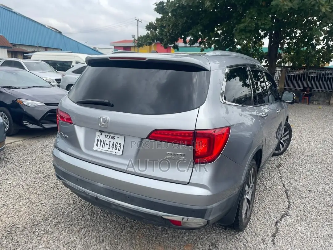 Honda Pilot Touring 4dr SUV 4WD (3.5L 6cyl 9A) 2016 Silver