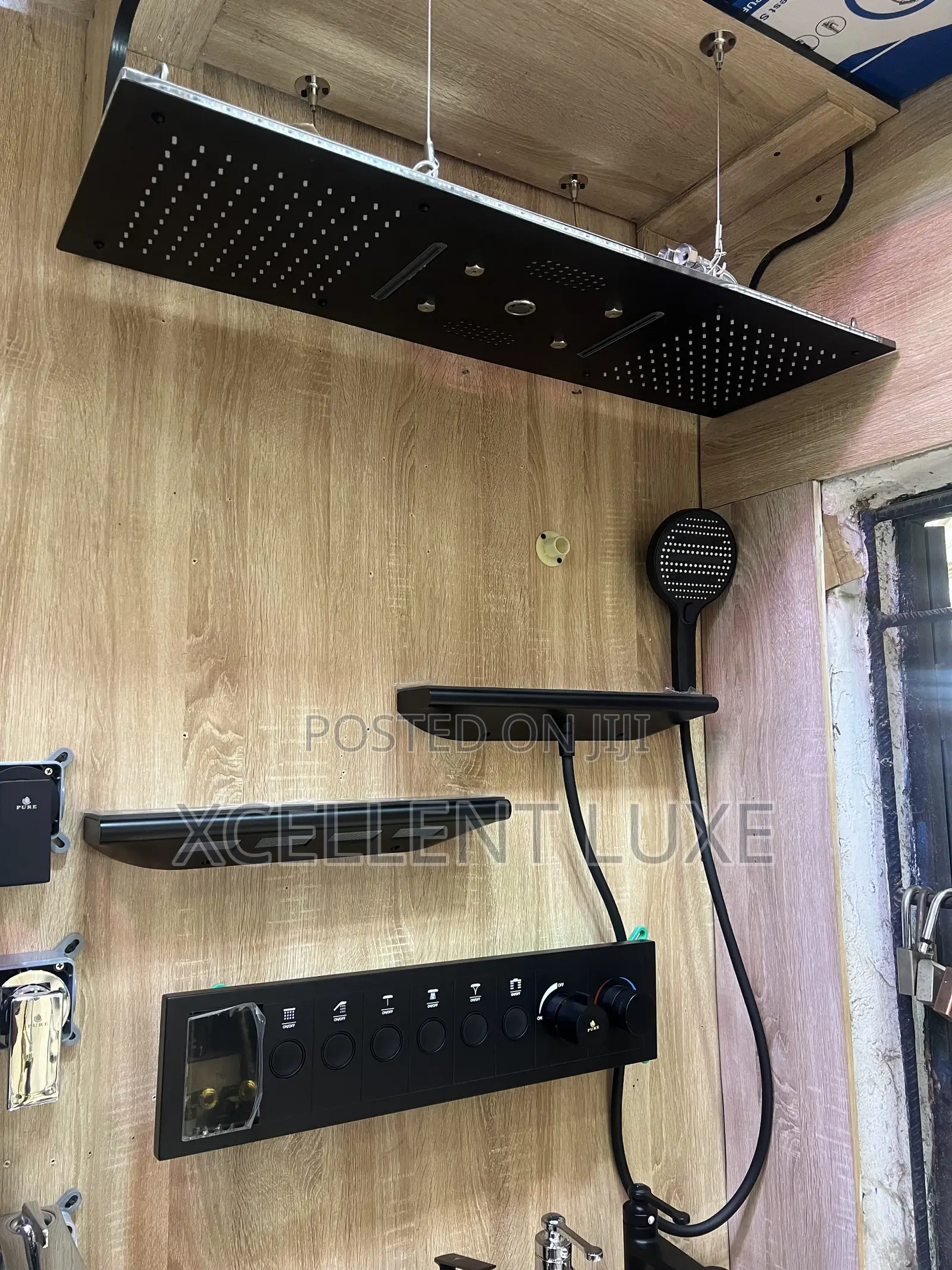 Conduit Shower Mixer With Ceiling Mount Shower Head and Shoulder Jets.